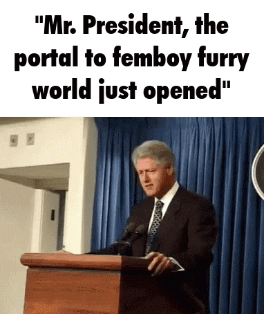 a man in a suit and tie is giving a speech at a podium .