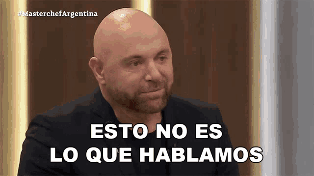 a bald man with a beard is on a masterchef argentina show