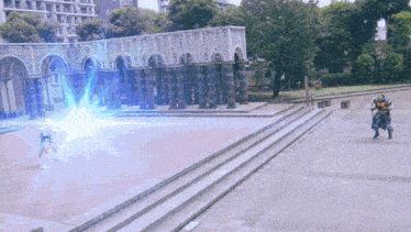 a man riding a motorcycle in a park with a blue light coming out of his pants