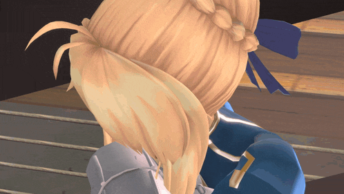 a close up of a person 's blonde hair with a blue bow