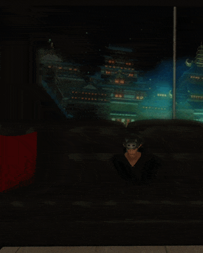 a man in a mask sits on a black couch in front of a window