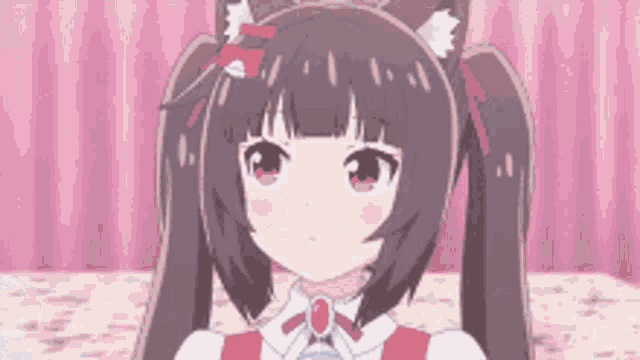 a close up of a girl with pigtails and cat ears wearing a red and white dress .