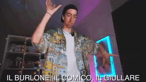 a man in a colorful shirt is dancing in a room with a purple background .