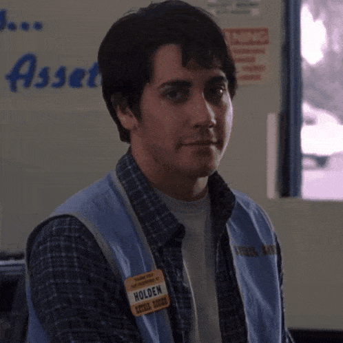 a man with a name tag that says holden on it