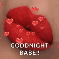 a close up of a woman 's lips with red lipstick and hearts around them .
