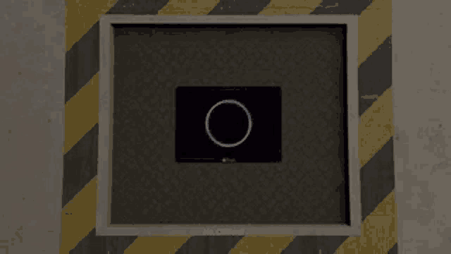 a black box with a blue circle on it and the word no on it