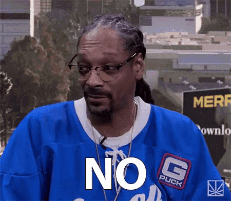 snoop dogg is wearing a blue puck jersey and says no