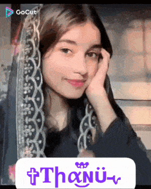 a girl with a veil on her head and the word thanu on the bottom right