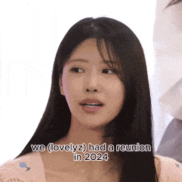 a woman with long hair says we ( lovelyz ) had a reunion in 2024