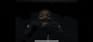 a man wearing boxing gloves with the letter o on them