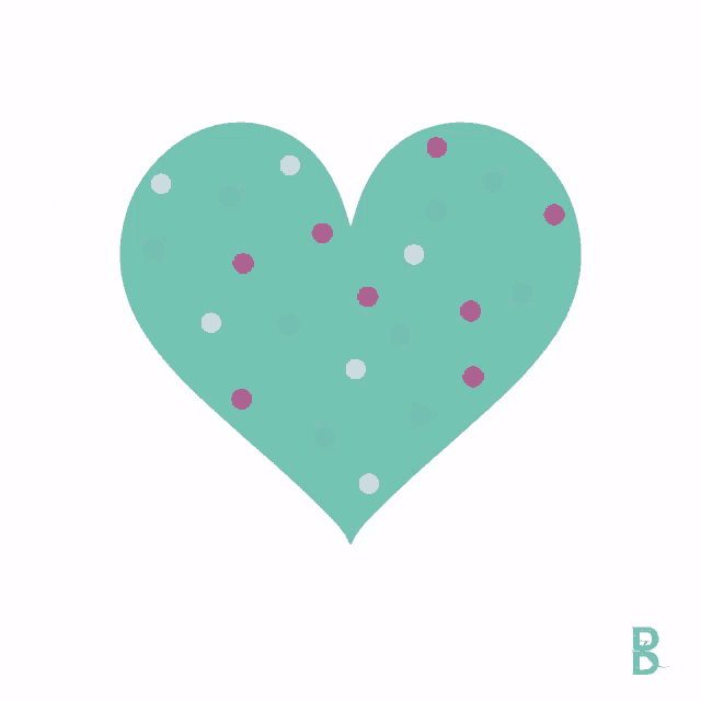 a teal heart with polka dots on it