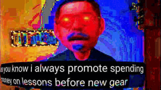 a man with red eyes is talking about spending money on lessons before a new gear
