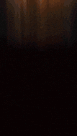 a painting of a lion with flames coming out of it 's mouth