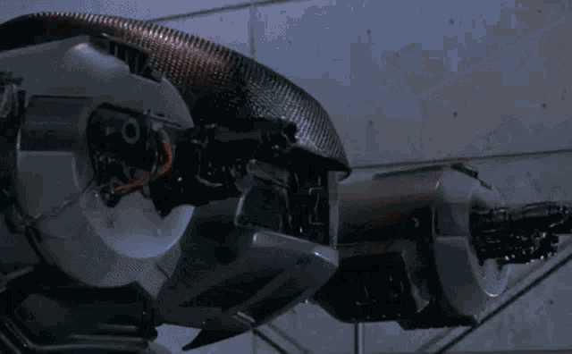a close up of a machine with flames coming out of it 's exhaust pipe .