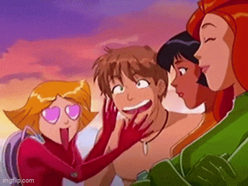 a group of cartoon characters are standing next to each other and one of them is licking another person 's face .