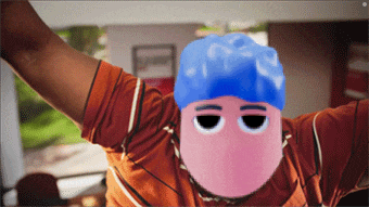 a man wearing an orange shirt and a pink face with blue hair