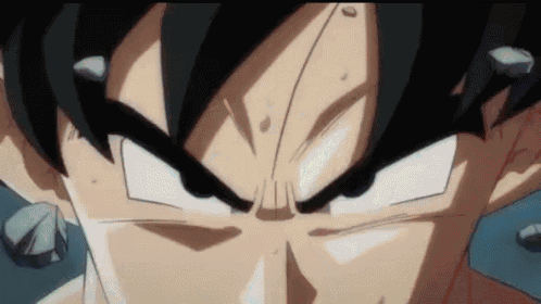 a close up of a person 's face with a very angry look on it .