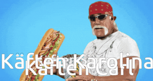 a man with a bandana on his head is holding a sandwich with the words kaften karolina written below him