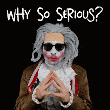 a man in a joker costume with the words why so serious above him