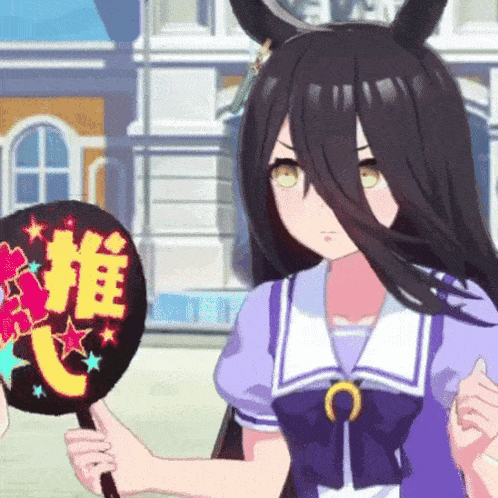 a girl in a purple dress is holding a fan with chinese characters on it