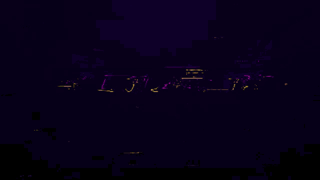 a purple background with pink and yellow dots and the letter l in the middle