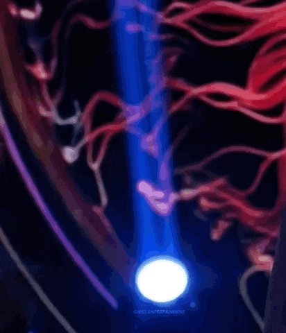 a blurry picture of a person with red hair and a blue light coming out of it