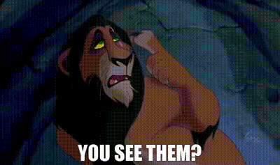 a bunch of cats are standing in a pile with the words " you see them " above them