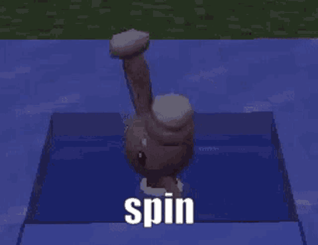 a cartoon rabbit is floating in the water with the words spin below it