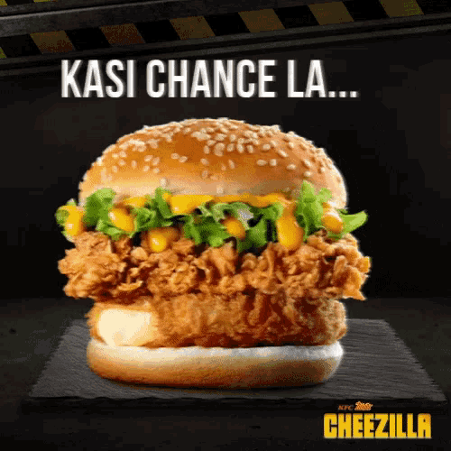 a fried chicken sandwich with cheese and lettuce on a bun with the words kasi chance la