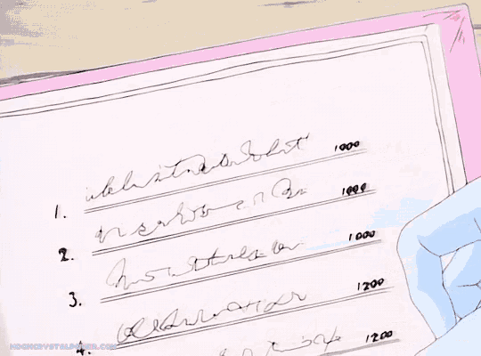 a hand is holding a piece of paper with a list of things to do