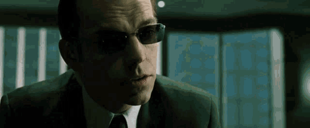 The Matrix Agent Smith GIF - The Matrix Agent Smith We Are The Cure GIFs