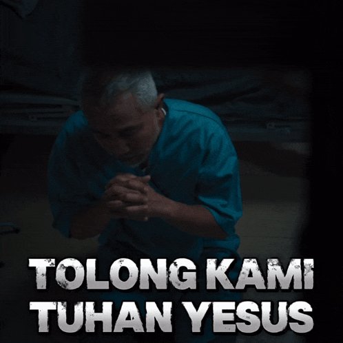 a poster with a man praying and the words tolong kami tuhan yesus on it