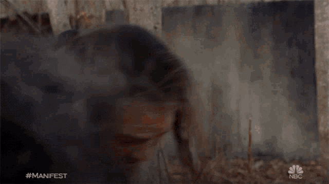 a woman is being held by a man in a scene from nbc called manifest