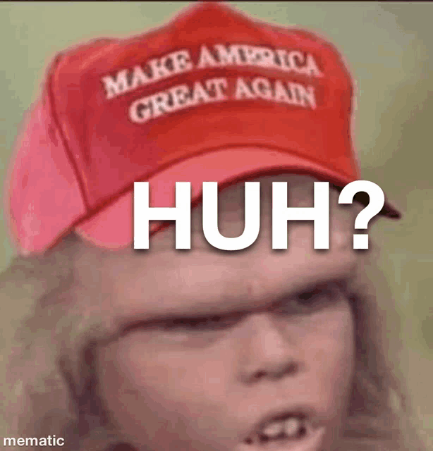 a person wearing a make america great again hat says huh