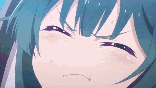 a close up of a girl 's face with blue hair and purple eyes