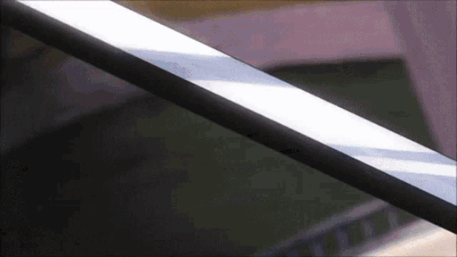 a close up of a computer screen with a purple and white background