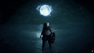 a person with a shield standing in a dark room