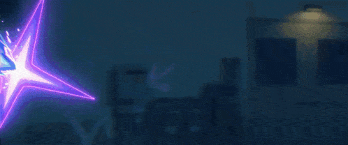 a person 's arm is glowing in purple and blue light