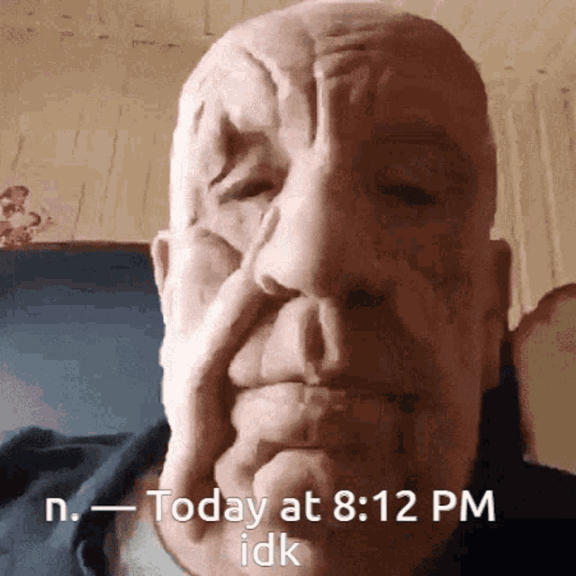 a man with his hand on his face says today at 8:12 pm