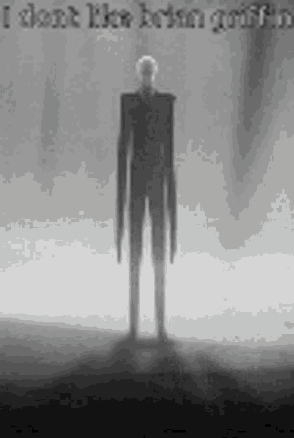 a black and white photo of a slender man standing in the dark