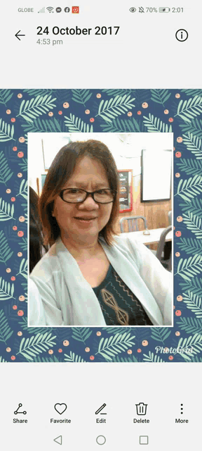 a phone screen shows a picture of a woman on october 24th 2017