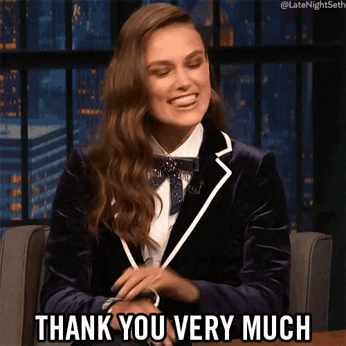 a woman sitting in a chair with the words thank you very much above her
