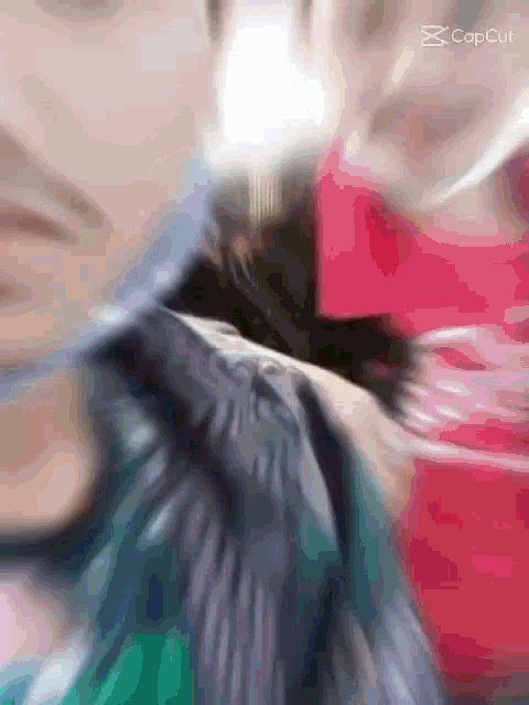 a blurred image of a person 's face with the caption cop cut