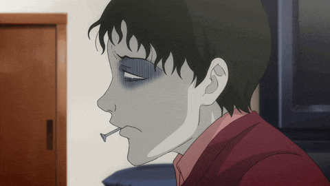 a man with a screw in his mouth looks tired
