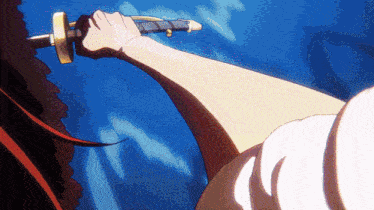 a person holding a sword in their hand with a blue background