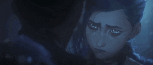a close up of a woman 's face in the water with her eyes closed .