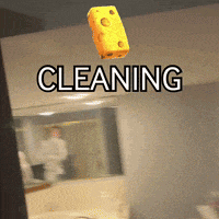 a piece of cheese is flying in the air with the word cleaning above it