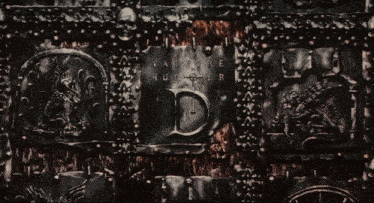 a vampire hunter logo is on a metal surface