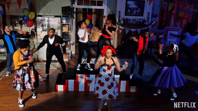 a group of people are dancing in a room with a netflix logo in the corner