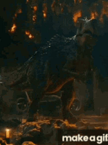 a gif of a dinosaur with the words make a gif written below it